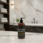 Anti-cellulite massage oil bottle with pump on a bathroom background